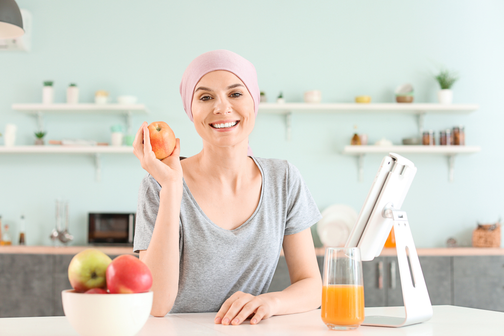 Woman,After,Chemotherapy,In,Kitchen,At,Home